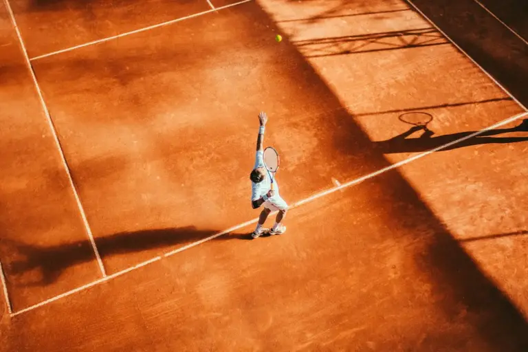 A tennis player hitting a forehand